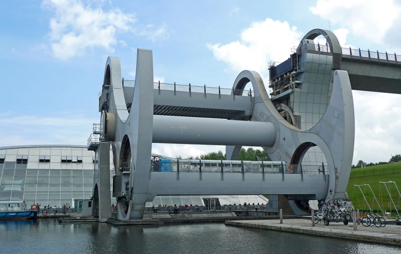 The Falkirk Wheel is a unique rotating structure that lifts entire ships