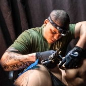 The pain and serenity of the tattooing process in photographs by Ann Baloch Laver