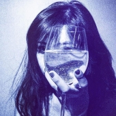 The superiority of blue: a young man writes fascinating pictures with a ballpoint pen