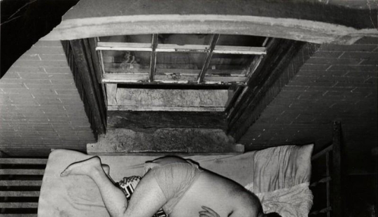 Weegee is a restless photographer who has been everywhere and everywhere