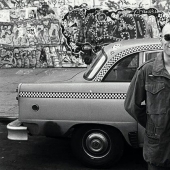 Why are taxis all over the world marked with checkers?