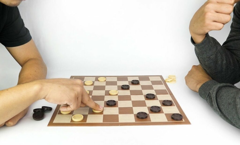 Why are taxis all over the world marked with checkers?