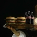 "Your burger, Madonna": the heroes of Renaissance paintings devour mountains of fast food