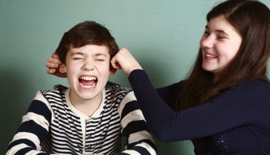 How did the custom of pulling boys' ears on their birthday come about